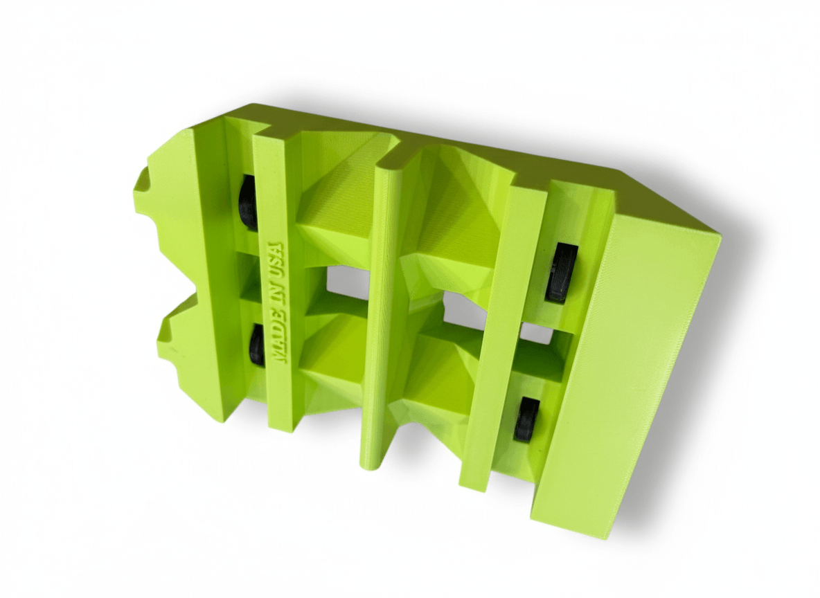 Green modular shelf with multiple compartments and black support elements.